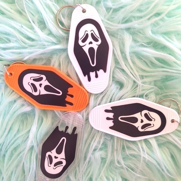 Ghost face/scream retro motel keychain. Listing price for one keychain o… - Picture 1 of 1